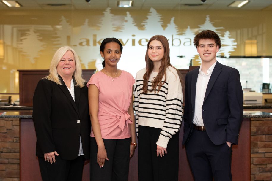 Photo of four people, our 2026 Legacy Award Recipients