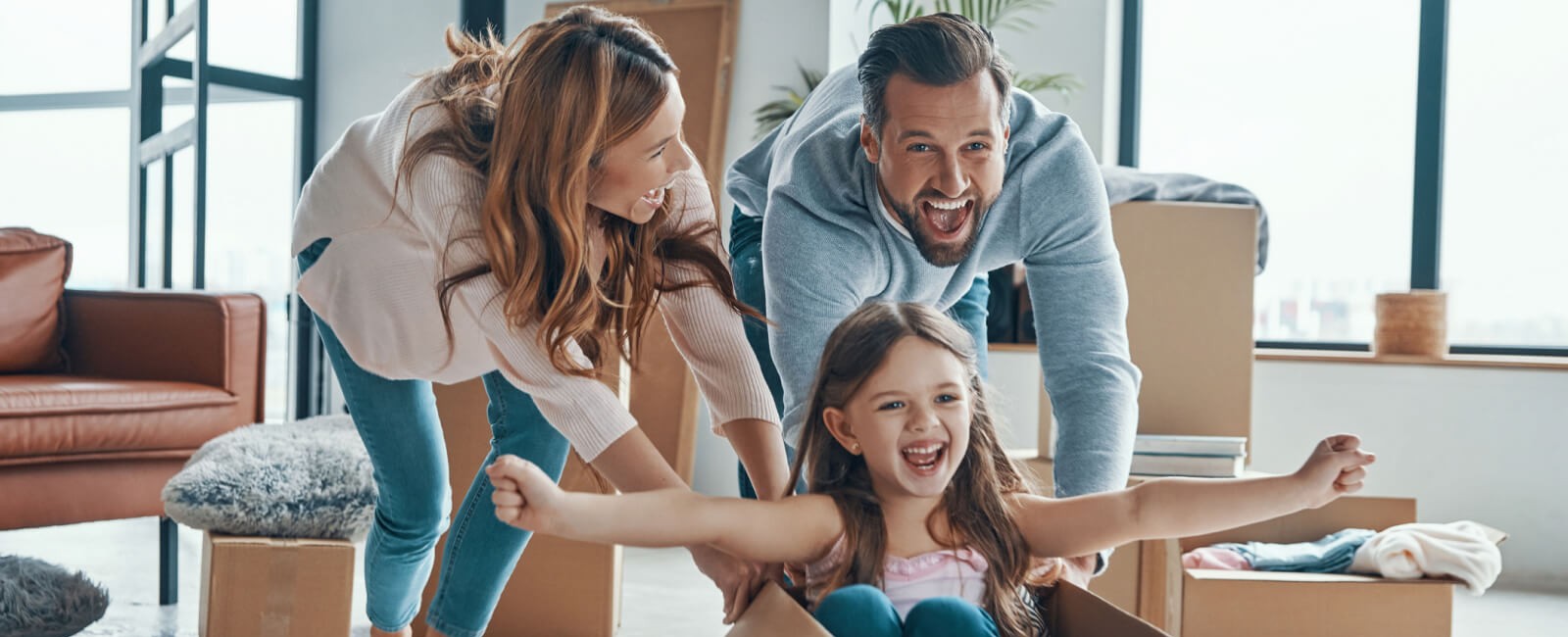 Picture of family just moving into home