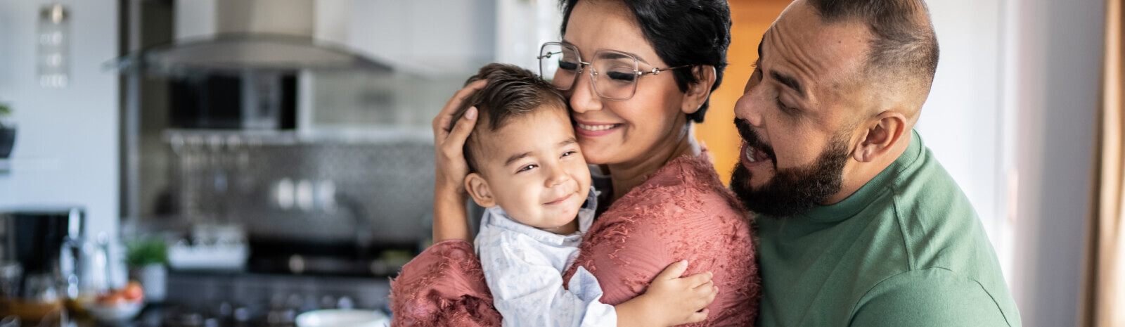 photo of mother and father will small child